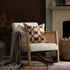 Fyne Ecru Boucle Rocking Natural Oak Armchair with Rattan Armrests - daals
