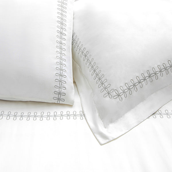 Milano Glacier Grey Knot Embroidered 600 Thread Count Cotton Sateen Continental Square Pillowcases - Pair
