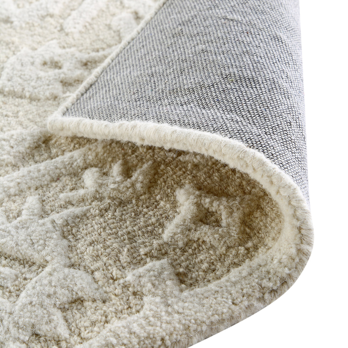 Dredded Rug Lourdes Hand Tufted and Textured Cream Wool Rug | daals