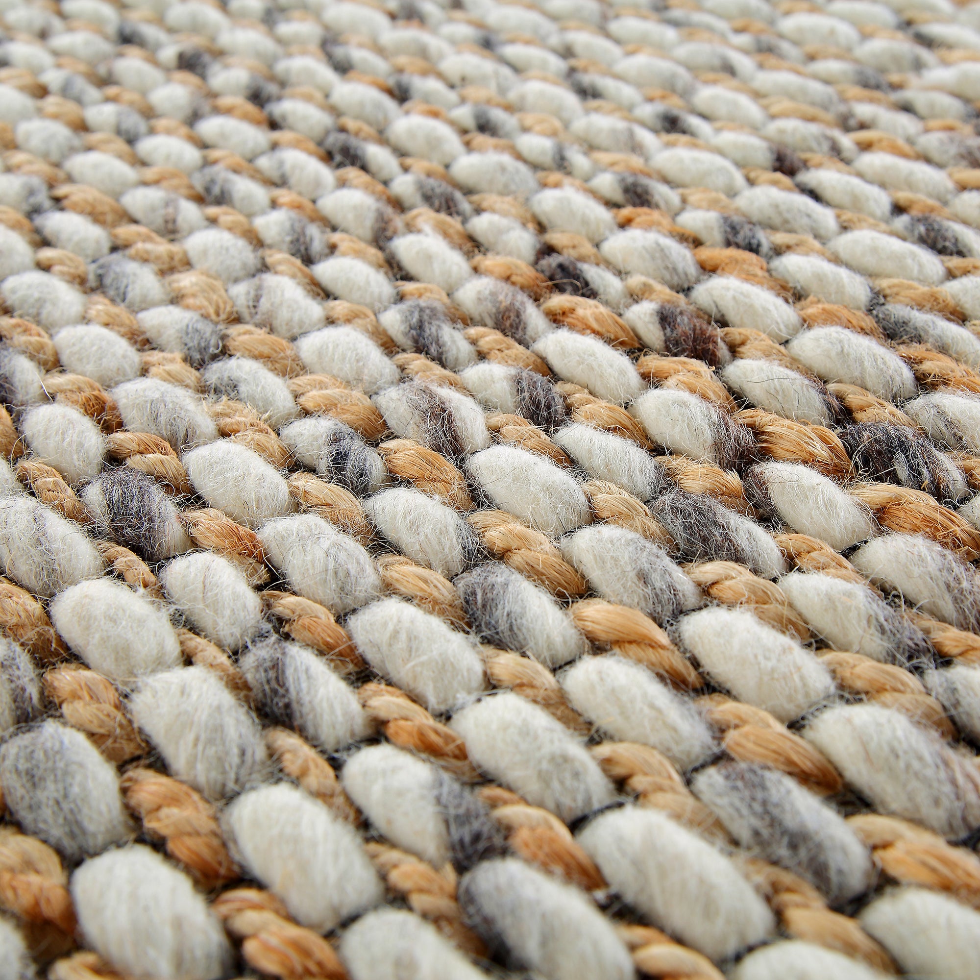 Kerala Variegated Wool and Jute Hand Braided Round Rug | daals